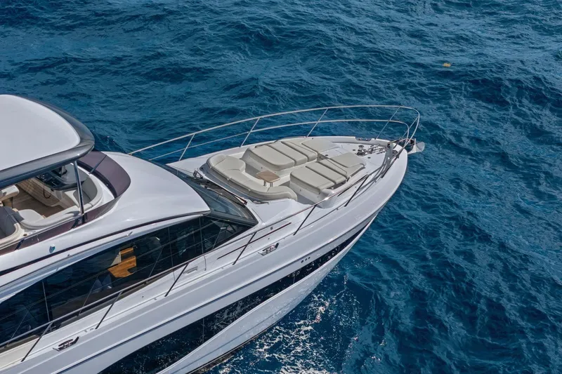 Slide: The Image of Luxurious 2026 Princess F65 yacht cruising on vibrant blue ocean waters. - 9