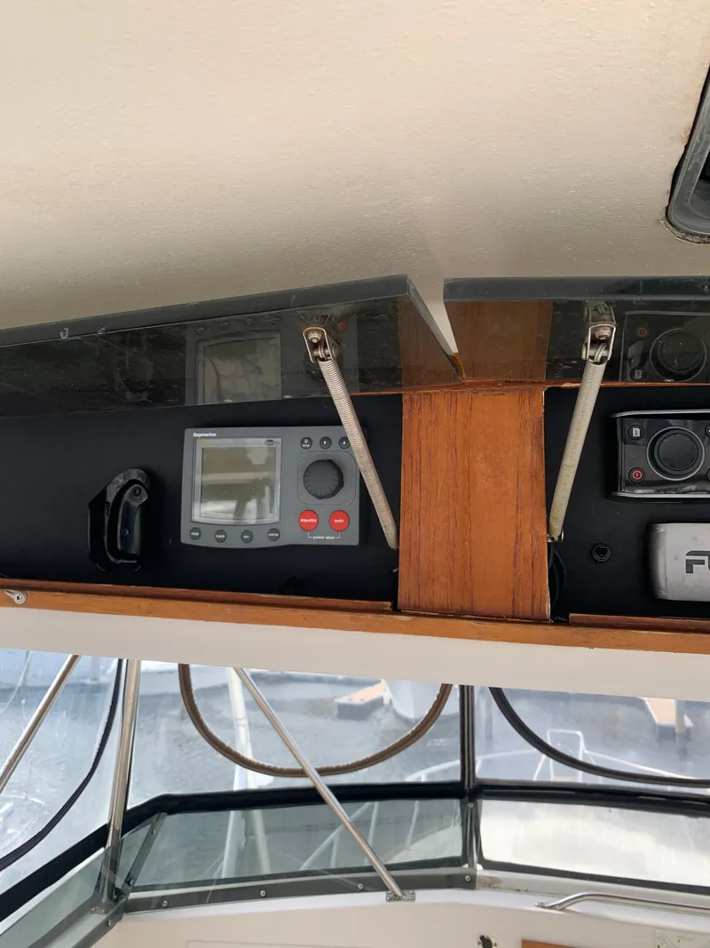 Slide: The Image of Control panel of a 1985 Ocean Yachts 55 Super Sport boat. - 16