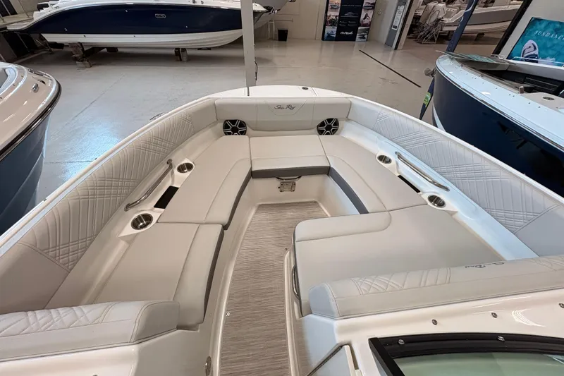 Slide: The Image of Luxurious interior of 2026 Sea Ray SDX 230 boat with spacious seating and cup holders. - 5