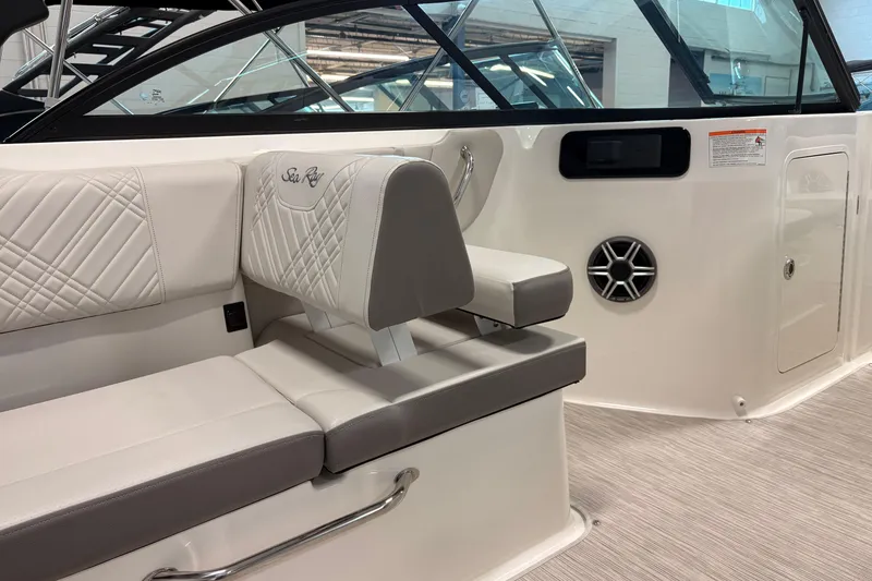 Slide: The Image of 2026 Sea Ray SDX 230 interior with luxurious seating and modern design features. - 8