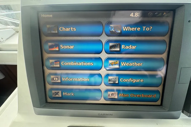 Slide: The Image of Garmin marine navigation display on 2008 Luhrs 41 Open boat, showing various function options. - 44