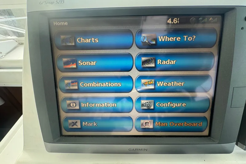Slide: The Image of Garmin GPSmap 5215 display on 2008 Luhrs 41 Open boat, showing navigation options. - 45