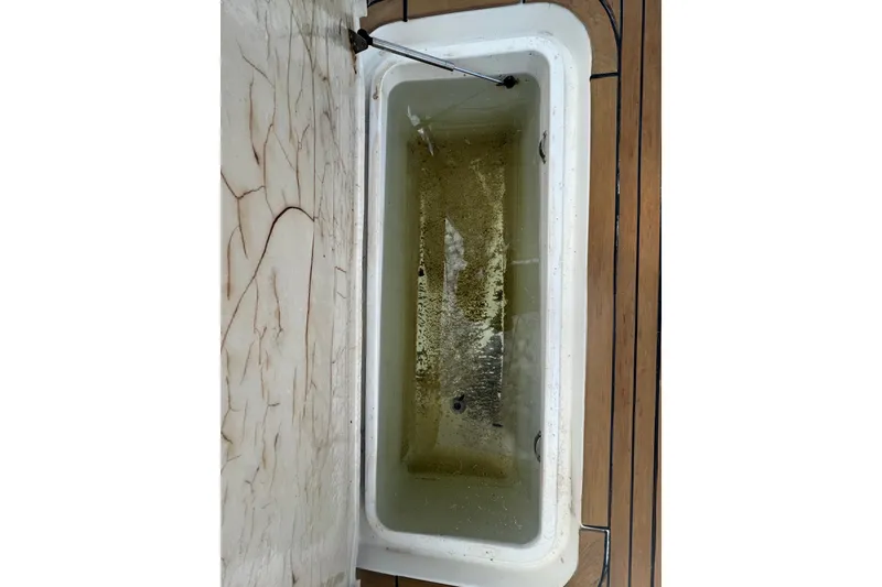Slide: The Image of Livewell on 2008 Luhrs 41 Open boat with wooden deck. - 19