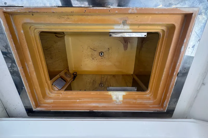 Slide: The Image of Open hatch on 2008 Luhrs 41 Open boat, showing interior compartment details. - 29