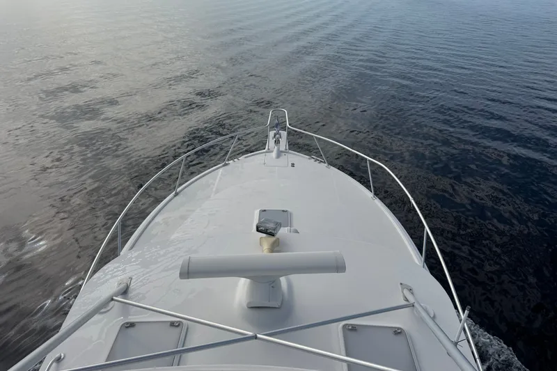 Slide: The Image of Bow view of 2008 Luhrs 41 Open yacht cruising on calm water. - 62