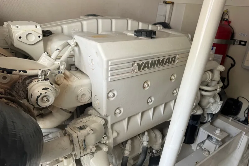 Slide: The Image of Yanmar engine in a 2008 Luhrs 41 Open boat, showcasing mechanical components. - 96