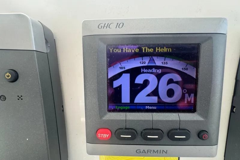 Slide: The Image of Garmin GHC 10 display showing heading of 126° on 2008 Luhrs 41 Open boat. - 46