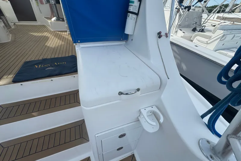 Slide: The Image of 2008 Luhrs 41 Open yacht deck with seating and storage compartments. - 31