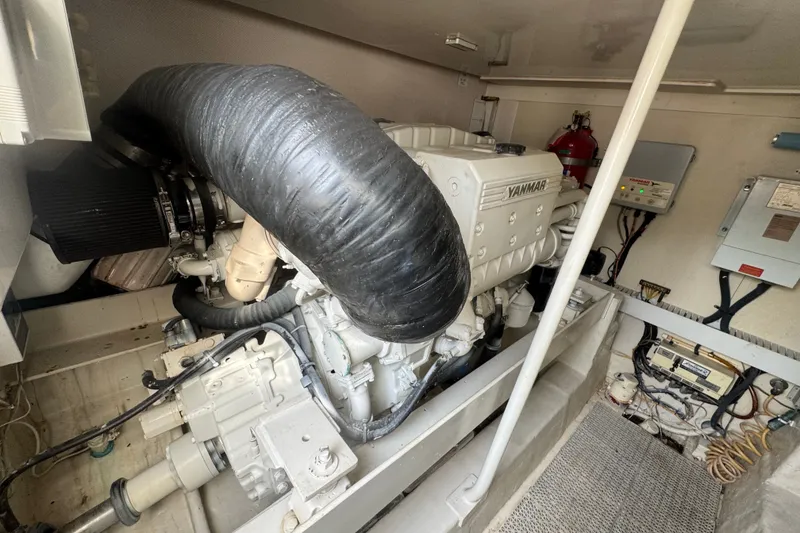 Slide: The Image of Engine room of 2008 Luhrs 41 Open boat featuring Yanmar engine components. - 98