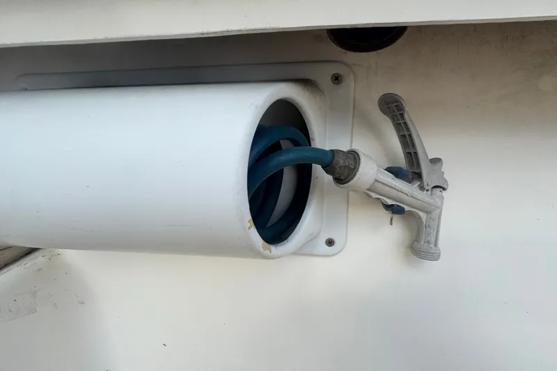 Slide: The Image of Coiled hose and nozzle on 2008 Luhrs 41 Open boat. - 25