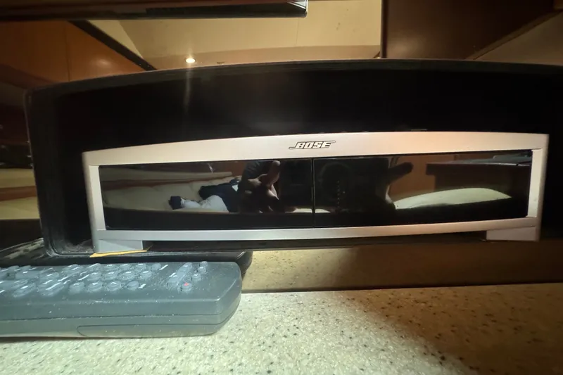 Slide: The Image of Bose sound system with remote on a Luhrs 41 Open 2008 yacht interior. - 77