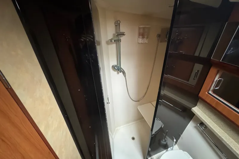 Slide: The Image of Bathroom interior of 2008 Luhrs 41 Open yacht, featuring shower and modern fixtures. - 73
