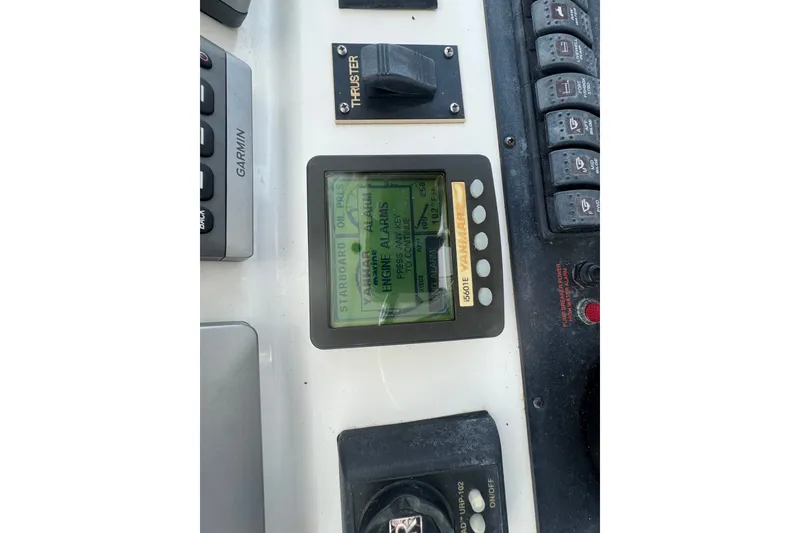 Slide: The Image of Control panel of a 2008 Luhrs 41 Open boat with engine alarms displayed. - 43