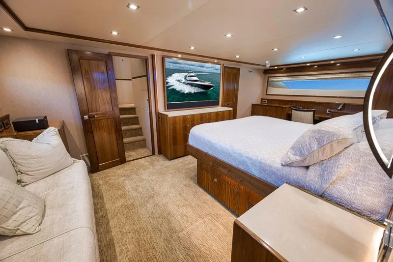 Slide: The Image of Luxurious interior of 2018 Viking 92 Sky Bridge yacht with elegant bedroom design. - 101