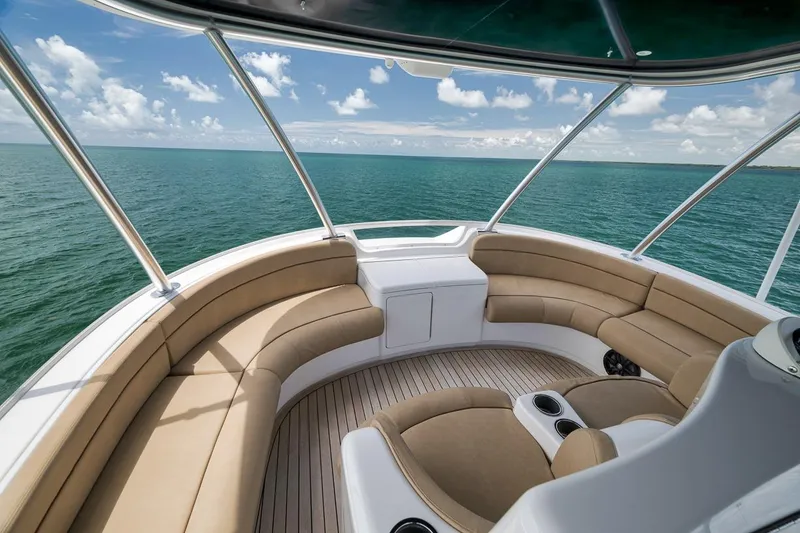 Slide: The Image of Luxurious seating area on 2018 Viking 92 Sky Bridge yacht with ocean view. - 62