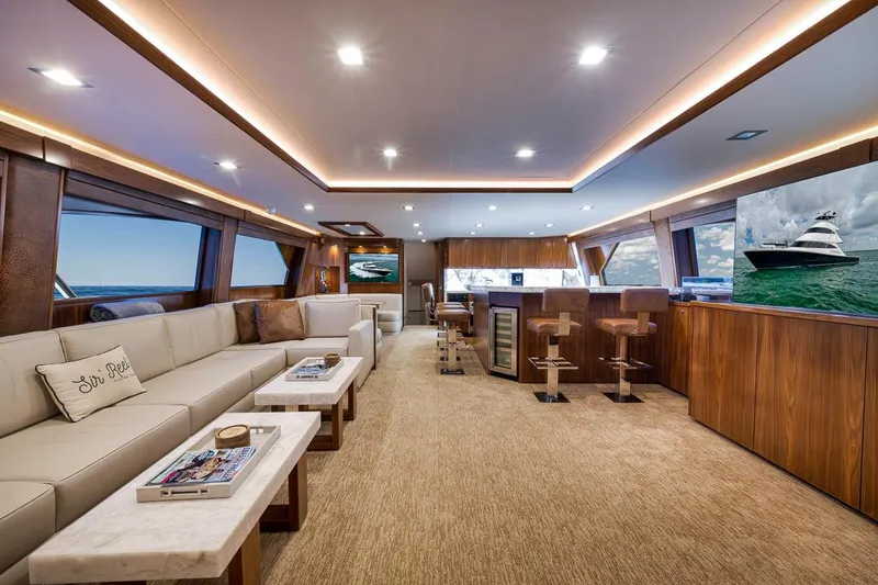 Slide: The Image of Luxurious interior of 2018 Viking 92 Sky Bridge yacht with elegant seating and modern amenities. - 83