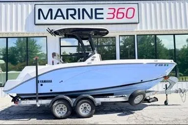 The Image of 2025 Yamaha Boats 222 FSH Sport E on trailer at Marine 360 dealership. - 1