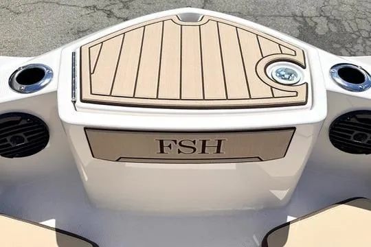 Slide: The Image of 2025 Yamaha Boats 222 FSH Sport E bow with cup holders and speakers. - 28