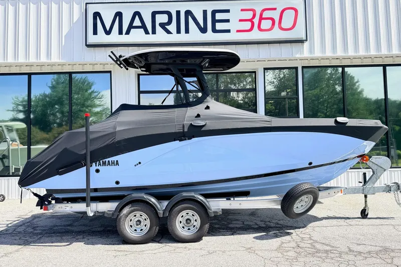 Slide: The Image of 2025 Yamaha Boats 222 FSH Sport E on trailer at Marine 360 dealership. - 4