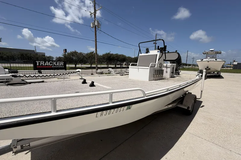 Slide: The Image of Custom 2017 Battersea boat on trailer under clear blue sky. - 6