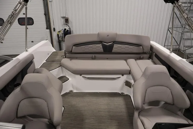Slide: The Image of Interior of 2026 Four Winns HD3 boat with luxurious seating and modern design. - 25
