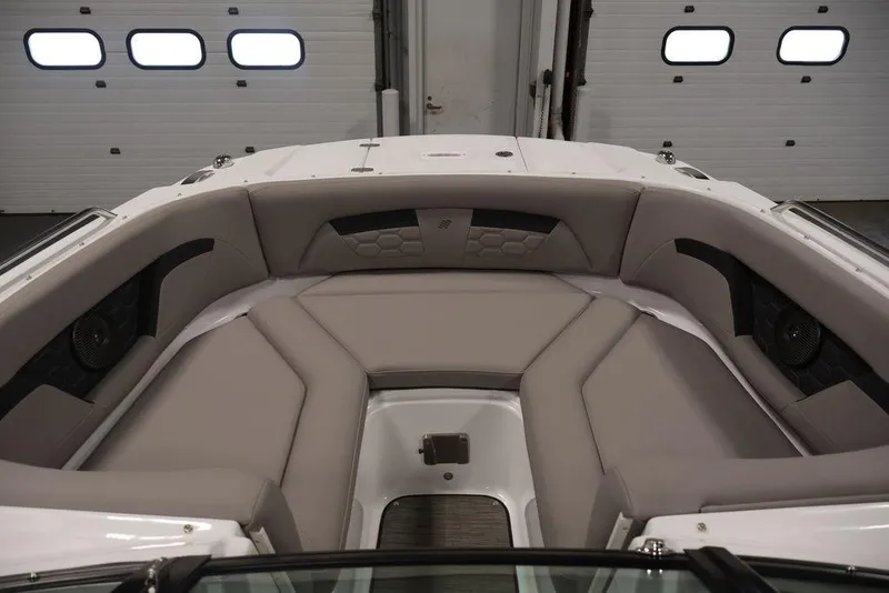Slide: The Image of Interior of 2026 Four Winns HD3 boat with plush seating and modern design. - 26