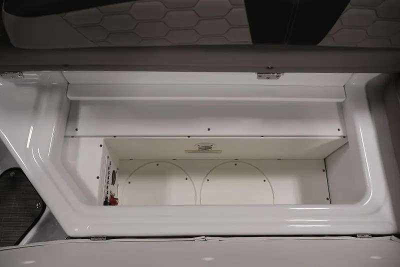 Slide: The Image of Storage compartment of 2026 Four Winns HD3 boat, featuring sleek white interior design. - 27