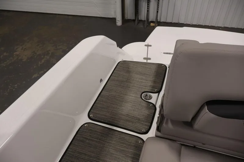 Slide: The Image of Interior view of 2026 Four Winns HD3 boat with sleek seating and flooring. - 31