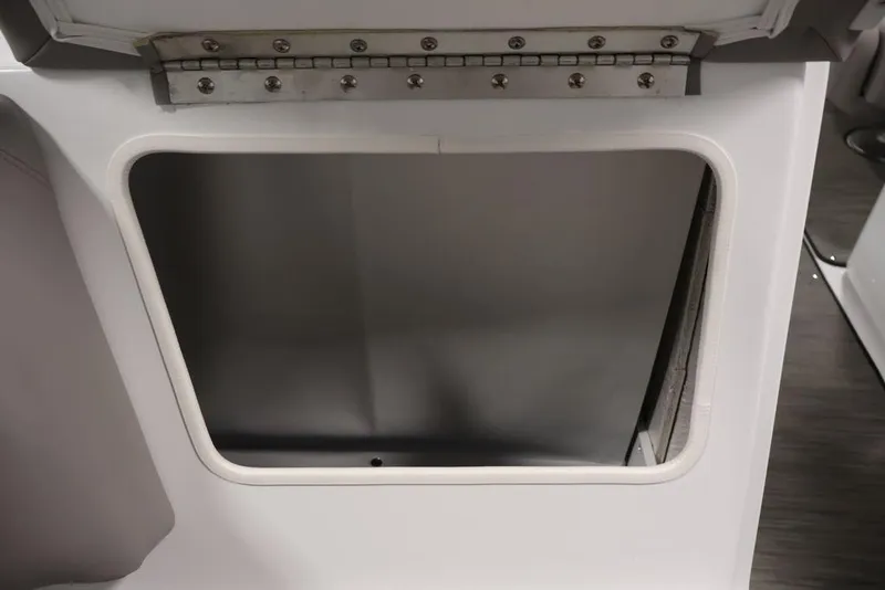 Slide: The Image of Open storage compartment on a 2026 Four Winns HD3 boat. - 40