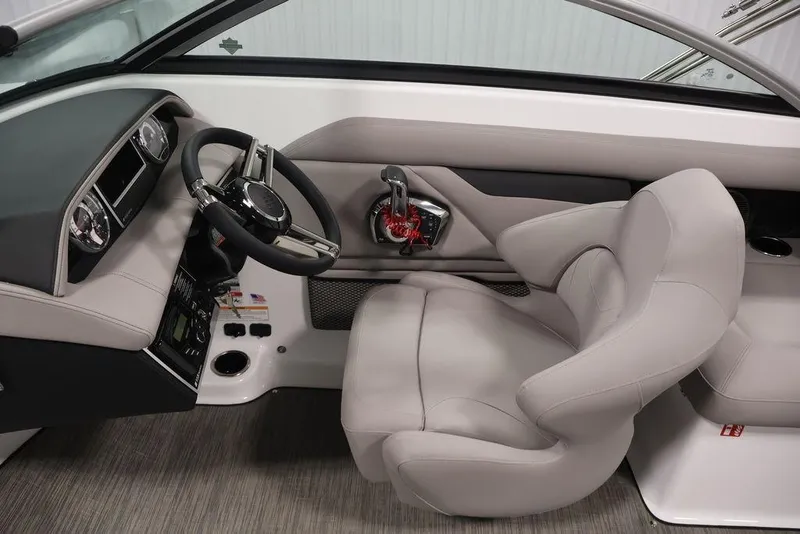 Slide: The Image of 2026 Four Winns HD3 boat interior with sleek steering wheel and modern dashboard design. - 53