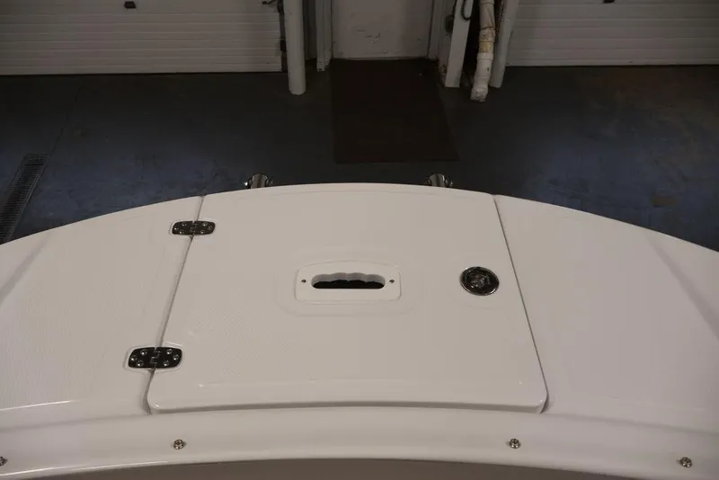 Slide: The Image of 2026 Four Winns HD3 boat deck with storage hatch and sleek design. - 54