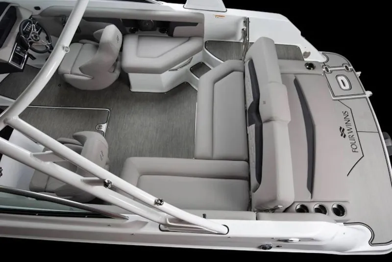 Slide: The Image of 2026 Four Winns HD3 boat interior with sleek seating and modern design. - 9