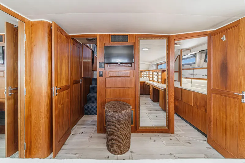 Slide: The Image of Luxurious wooden interior of a 1991 Californian 55 Cockpit Motor Yacht with modern amenities. - 40