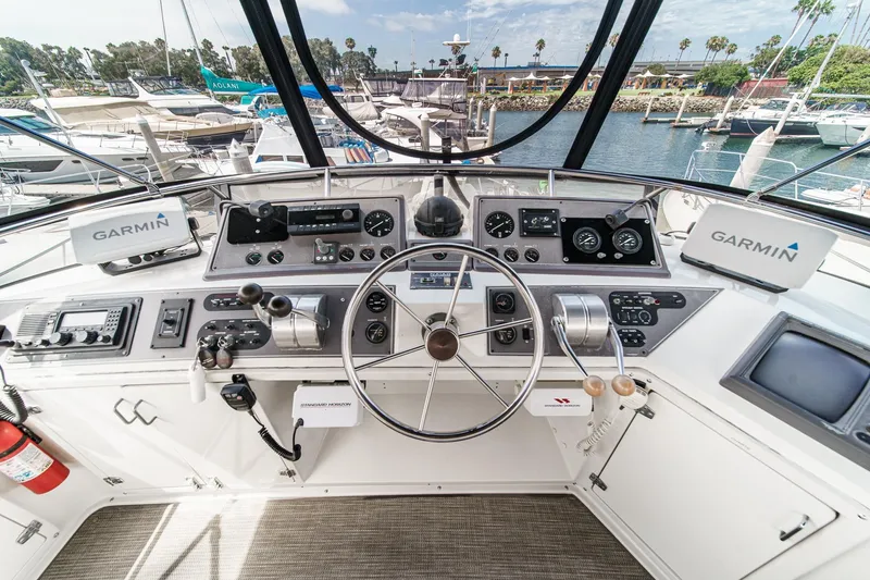 Slide: The Image of Cockpit of 1991 Californian 55 Cockpit Motor Yacht with Garmin navigation systems. - 49