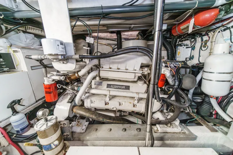 Slide: The Image of Engine room of 1991 Californian 55 Cockpit Motor Yacht with Caterpillar engine. - 55