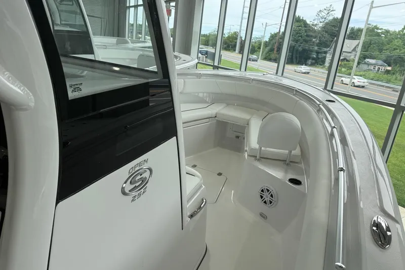 Slide: The Image of 2026 Sportsman Open 252 Center Console boat interior, showcasing sleek design and seating area. - 2