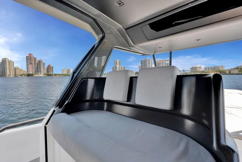 Slide: The Image of Interior view of 2021 Bluegame BG 42 yacht with city skyline in background. - 27