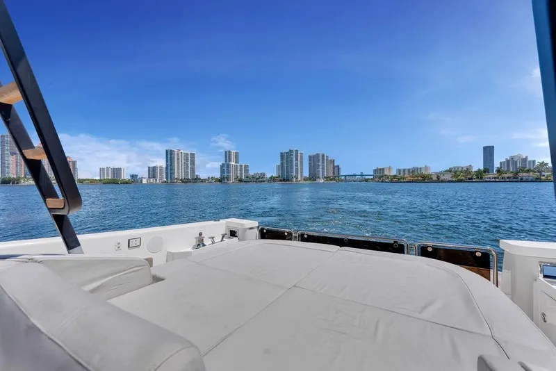 Slide: The Image of View from 2021 Bluegame BG 42 yacht, overlooking city skyline and calm waters. - 32