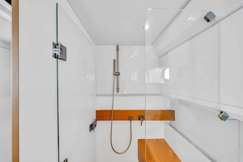 Slide: The Image of Modern shower area in 2021 Bluegame BG 42 yacht, featuring sleek design and glass enclosure. - 48