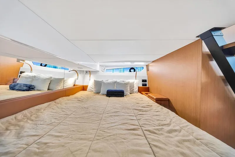Slide: The Image of Luxurious cabin interior of 2021 Bluegame BG 42 yacht with cozy bedding. - 60