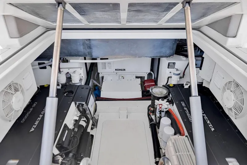 Slide: The Image of Engine room of 2021 Bluegame BG 42 yacht with Volvo Penta engines and Kohler generator. - 61