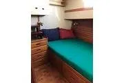 Slide: The Image of Cozy cabin interior of 1988 Grand Banks 46 Classic yacht with wooden furnishings. - 5