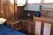 Slide: The Image of Interior of 1988 Grand Banks 46 Classic yacht with wooden furnishings and cozy decor. - 7