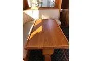 Slide: The Image of Interior of 1988 Grand Banks 46 Classic yacht with wooden dining table and seating. - 9