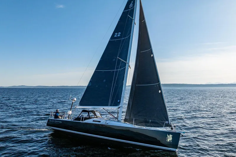 The Image of Sailing yacht J Boats J/124 (2007) gliding on open water under clear blue skies. - 0