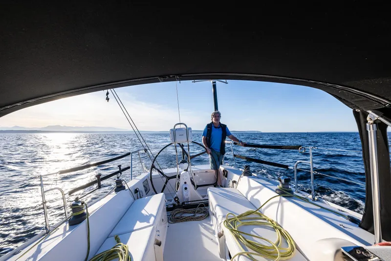 Slide: The Image of Sailing a 2007 J Boats J/124 yacht on open sea under clear skies. - 11