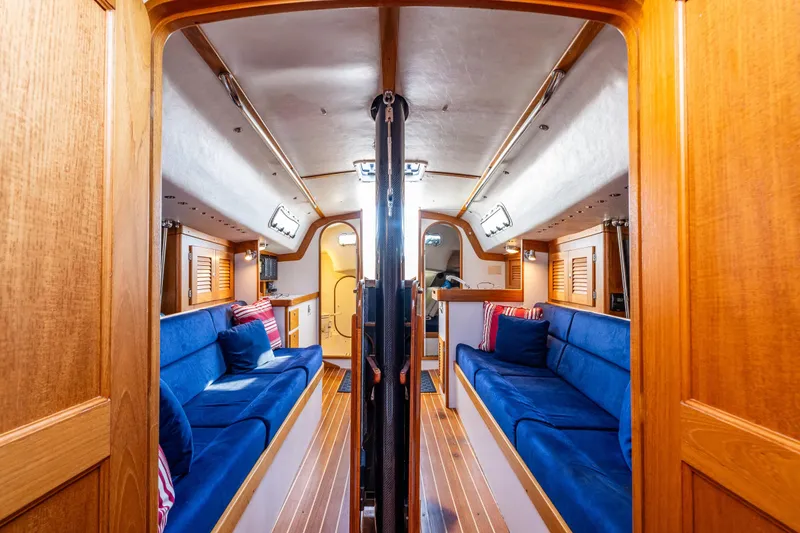 Slide: The Image of Luxurious 2007 J Boats J/124 interior with blue seating and wooden finishes. - 14