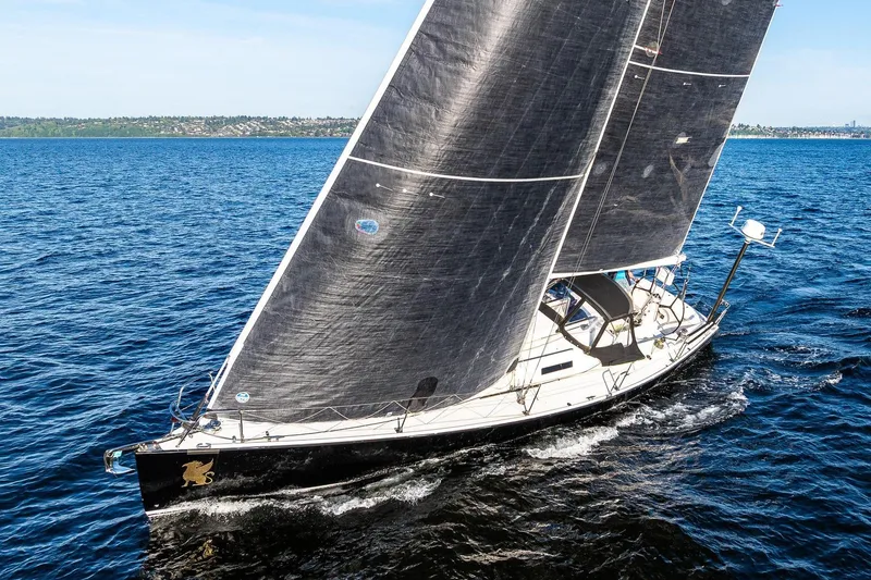 Slide: The Image of Sailing yacht J Boats J/124 (2007) gliding on open blue water under clear skies. - 2