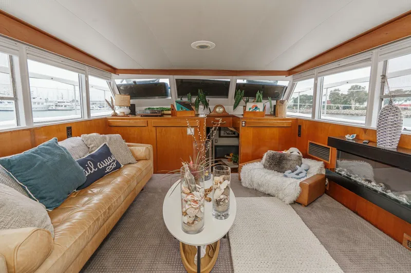 Slide: The Image of Luxurious 1969 Burger Flush Deck yacht interior with cozy seating and elegant decor. - 33