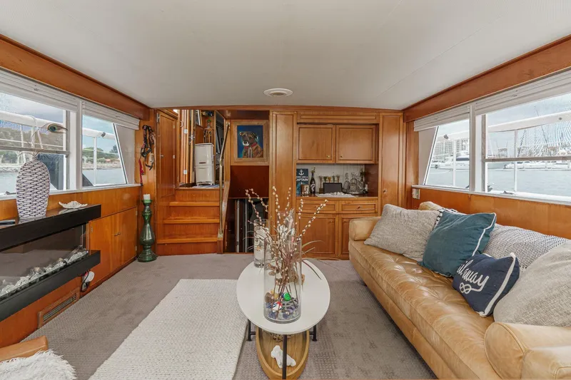 Slide: The Image of Luxurious 1969 Burger Flush Deck yacht interior with cozy seating and elegant decor. - 34